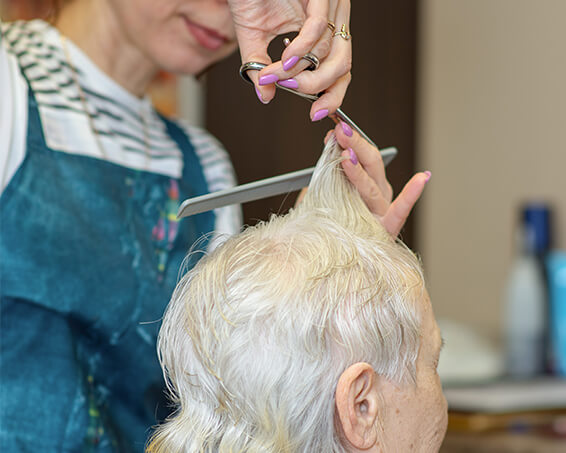Resident Having Their Hair Cut