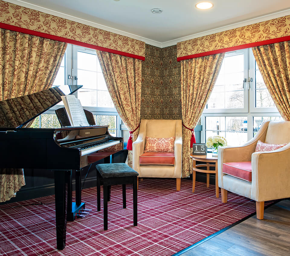 Grand Piano and Armchairs