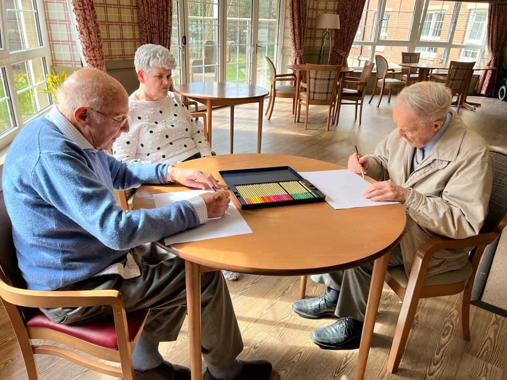 Male Residents Partaking in Some Easter Drawing