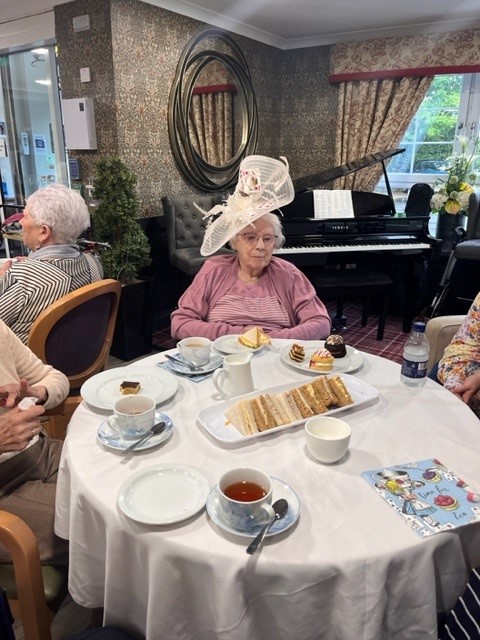 Residents Enjoying a Tea Party in The Dining Room
