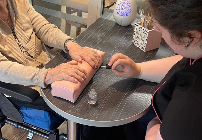 resident getting their nails done