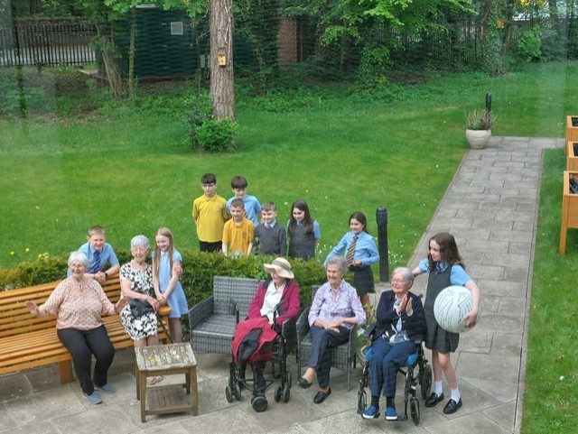 Grandparents Day celebration at Bothwell Castle, residents sharing stories with their families