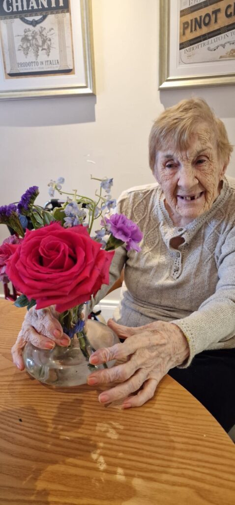 Grandparents Day celebration at Bothwell Castle, residents sharing stories with their families