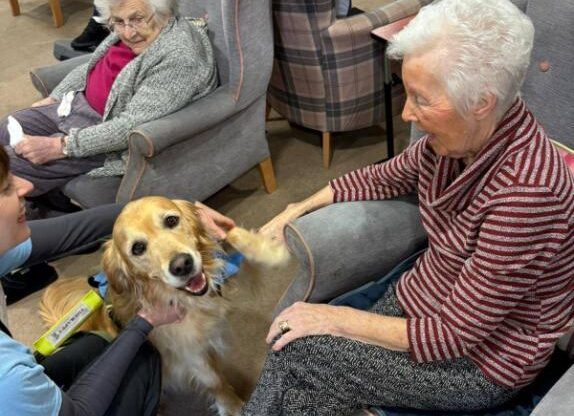 residents with jin the dog